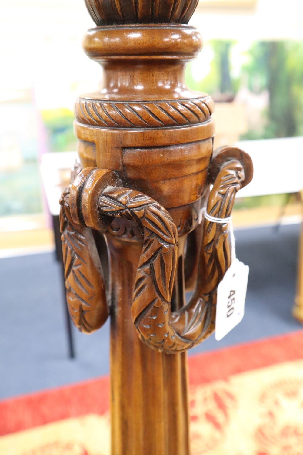 A Georgian style mahogany torchere, height 148cm